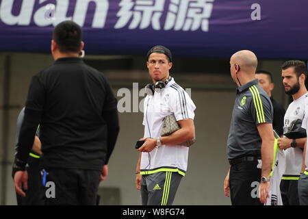 Cristiano Ronaldo of Real Madrid, center, arrives for a training session in Guangzhou city, south China's Guangdong province, 26 July 2015. Stock Photo