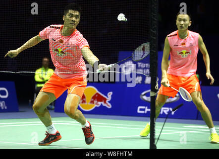 Fu Haifeng, right, and Zhang Nan of China compete against Hiroyuki Endo and Kenichi Hayakawa of Japan in their final match during the 2015 Sudirman Cu Stock Photo