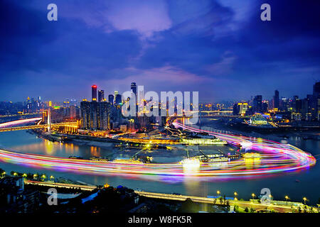 Skyline of Yuzhong Peninsula with the Chongqing World Financial Centre (WFC), tallest, and other skyscrapers and high-rise buildings in Jiefangbei CBD Stock Photo