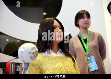 Humanoid robot Geminoid F, produced by renowned robot designer Hiroshi Ishiguro of Osaka University, is on display during the 2015 World Robot Confere Stock Photo