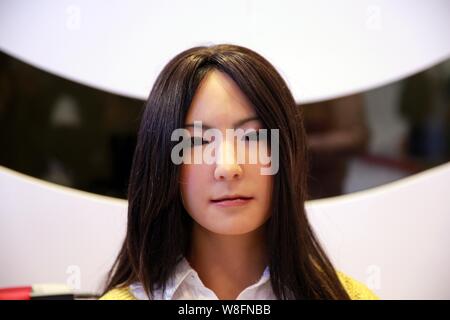 Humanoid robot Geminoid F, produced by renowned robot designer Hiroshi Ishiguro of Osaka University, is on display during the 2015 World Robot Confere Stock Photo