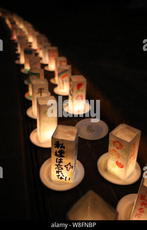 Nagasaki. 9th Aug, 1945. Photo taken on Aug. 8, 2019 shows candles made by local residents at the Peace Park in Nagasaki, Japan. Nagasaki was hit by an atomic bomb on Aug. 9, 1945, which prompted Japan's surrender and the end of World War II, making it the second city to have endured atomic bombing after Japan's Hiroshima was hit on Aug. 6 the same year. Credit: Du Xiaoyi/Xinhua/Alamy Live News Stock Photo