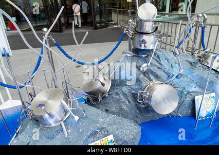 A giant fish made out of cooking utensils is on display during a  promotional event by German cookware maker Fissler at Jiuguang City Plaza  in Shanghai Stock Photo - Alamy