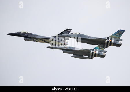 Three Belgian General Dynamics F-16's flying in formation at the Royal International Air Tattoo RIAT 2019 at RAF Fairford, Gloucestershire, UK Stock Photo