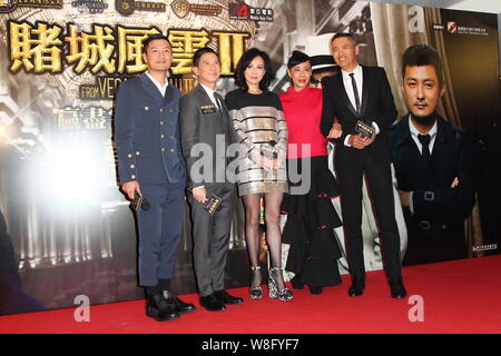 (From left) Hong Kong actors Shawn Yue, Nick Cheung, actress Carina Lau, Jasmine Tan, wife of actor Chow Yun-fat and Chow Yun-fat pose during the prem Stock Photo