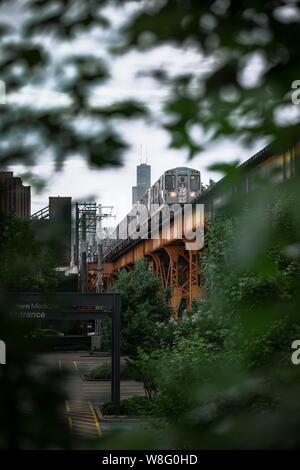 Vertical shot of a train on the bridge Stock Photo