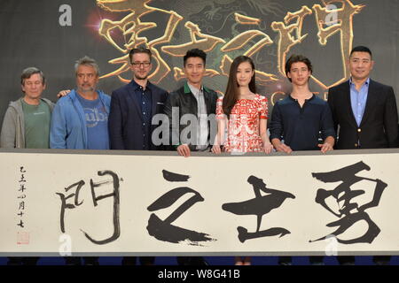 Chinese actress Ni Ni, third right, Taiwanese actor Mark Zhao, center, French director Luc Besson, second left, and other stars pose during a press co Stock Photo