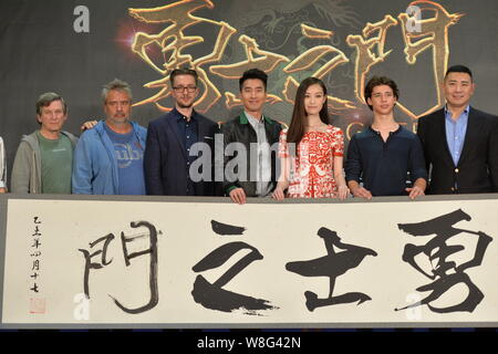 Chinese actress Ni Ni, third right, Taiwanese actor Mark Zhao, center, French director Luc Besson, second left, and other stars pose during a press co Stock Photo