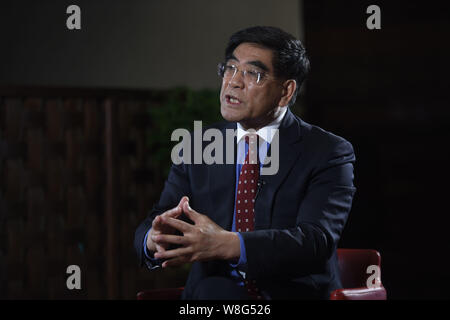 Fu Chengyu, Chairman of China Petroleum and Chemical Corp (Sinopec), speaks at an interview during the Third Session of the 12th National Committee of Stock Photo