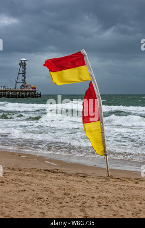 Bournemouth, UK. 9th Aug, 2019. Surfers and RNLI staff make the most of the very windy weather in Bournemouth in August. Credit: Thomas Faull/Alamy Live News Stock Photo