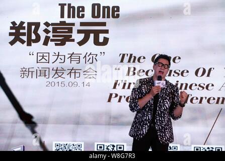 South Korean singer Jeong Soon-won, better known by his stage name The One, performs during a press conference for his Chinese album 'Because Of You' Stock Photo