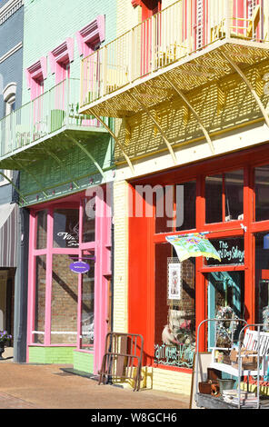 Downtown Yazoo City Mississippi features many buildings painted in pastel colors Stock Photo