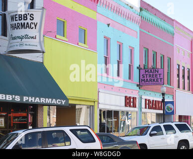 Downtown Yazoo City Mississippi features many buildings painted in pastel colors Stock Photo