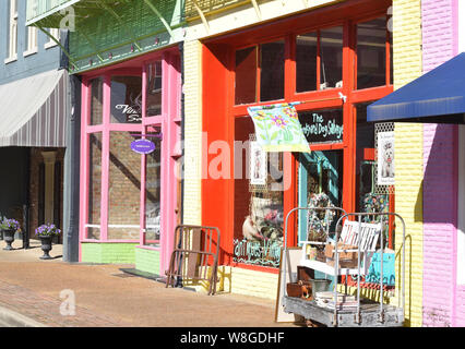 Downtown Yazoo City Mississippi features many buildings painted in pastel colors Stock Photo