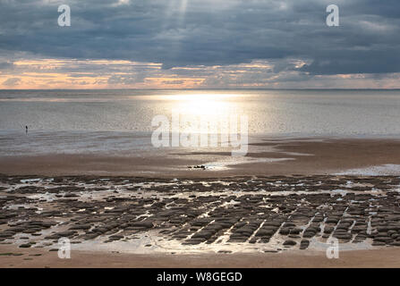 Distinctive large boulders in formation across the sandy beach of Hunstanton, Norfolk Stock Photo