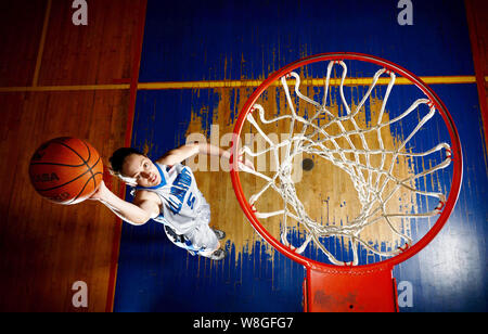 Air Force Academy Women's basketball player shooting a basketball in a posed photo Stock Photo
