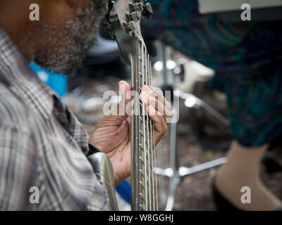 Close up of man playing a guitar Stock Photo