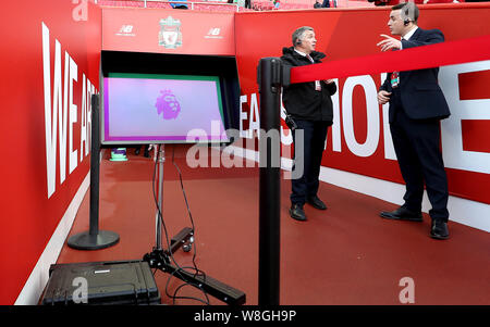 A view of the Video Assistant Referee (VAR) pitch side monitor near the players tunnel before the Premier League match at Anfield, Liverpool. Stock Photo