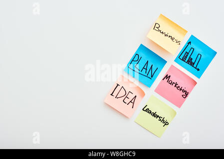 Reminder business papers with notes written on it isolated on white background. Horizontal shot. Business concept Stock Photo