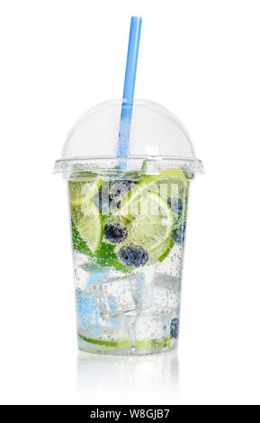 Lemonade with lime, blueberry and  mint in a plastic cup with drink straw isolated on white background. Take away drinks concept. Stock Photo