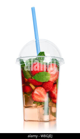 Lemonade with lime, strawberry and  mint in a plastic cup with drink straw isolated on white background. Take away drinks concept. Stock Photo