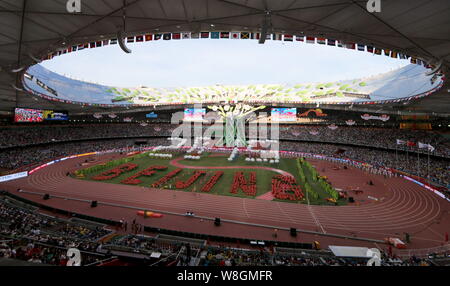 Chinese entertainers perform during the opening ceremony of the Beijing 2015 IAAF World Championships at the National Stadium, also known as the Bird' Stock Photo