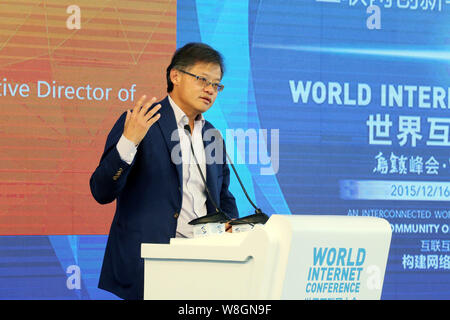 Jerry Yang, co-founder and former CEO of Yahoo!, delivers a speech at a forum during the 2nd World Internet Conference, also known as Wuzhen Summit, i Stock Photo