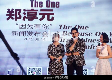 South Korean singer Jeong Soon-won, center, better known by his stage name The One, speaks during a press conference for his Chinese album 'Because Of Stock Photo