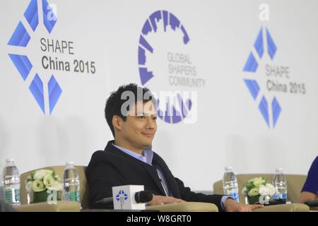 American actor Archie Kao smiles during the 1st 'SHAPE China 2015' summit ahead of the 'Summer Davos' Forum in Dalian city, northeast China's Liaoning Stock Photo