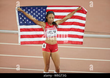 Allyson Felix of the United States celebrates after winning the women's 400m final during the Beijing 2015 IAAF World Championships at the National St Stock Photo