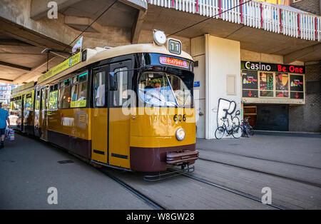 Rotterdam Netherlands, June 29 2019. Old fashioned retro tram in the city center, yellow color, sunny day Stock Photo