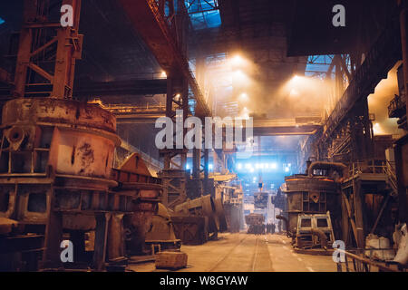 Melting of metal in a steel plant. Metallurgical industry. Stock Photo