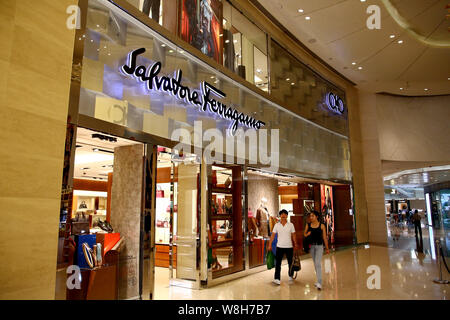 FILE Pedestrians walk past a boutique of Salvatore Ferragamo at a shopping mall in Shanghai China 1 September 2015. The chief executive of Ital Stock Photo Alamy