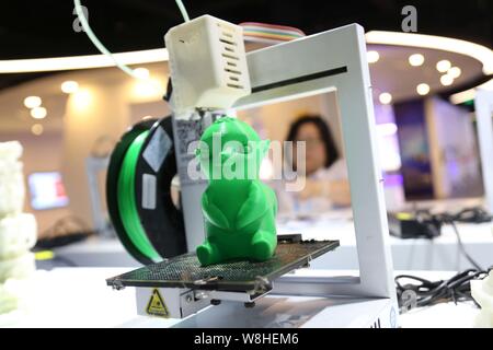 --FILE--A 3D printer is on display during an exhibition in Shanghai, China, 25 August 2015.   Shipment of 3D printers in the Chinese market is expecte Stock Photo