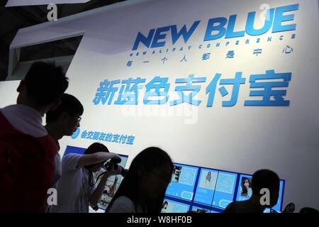 --FILE--People visit the stand of mobile payment service Alipay of Alibaba Group during the 13th China Digital Entertainment Expo, also known as China Stock Photo