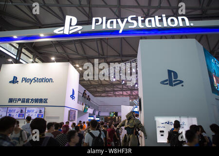 Visitors crowd the stand of PlayStation during the 13th China Digital Entertainment Expo, also known as ChinaJoy 2015, in Shanghai, China, 30 July 201 Stock Photo