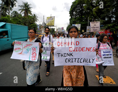 Scientist and students of different colleges hold placards during the march.March for Science is an international series of rallies and marches happening all over the world with a demand to local Government to sanction more budget on Scientific Education, this year’s demand for India was to sanction at least 10 % of central budget to scientific educational development & give proper honor to Article 51A of Indian Constitution. Stock Photo