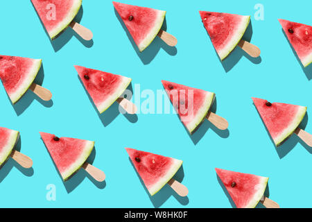 Flat lay top view of fresh watermelon slices on color background. Stock Photo