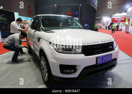 Range Rover Employee A Range Rover SUV of Jaguar Land Rover is on display during the 16th ...
