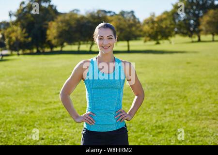 Young woman resting, hands on hip. Stock Photo