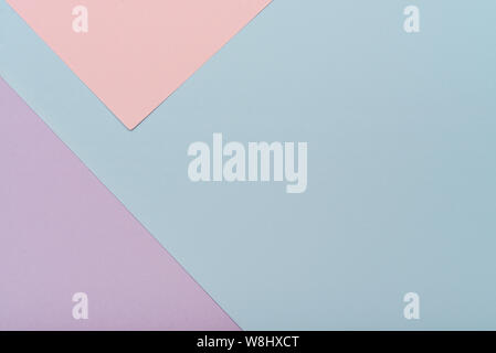 Blue and pink pastel color paper geometric flat lay background Stock Photo