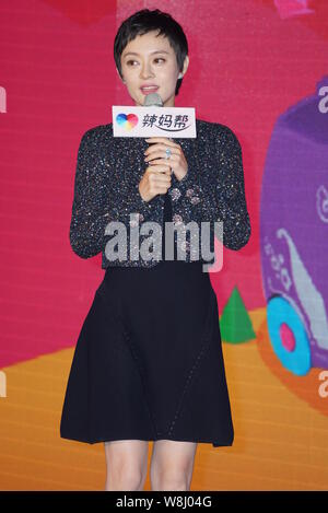 Chinese actress Sun Li speaks at a press conference for parenting APP 'Lamabang' in Shanghai, China, 22 April 2015. Stock Photo