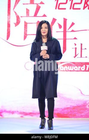 Chinese actress Zhao Wei poses during a press conference for a charity event in Beijing, China, 7 December 2015. Stock Photo