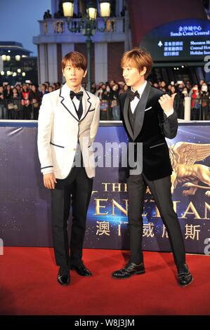 Lee Donghae, left, and Eunhyuk of South Korean pop group Super Junior pose on the red carpet as they arrive for the 15th Huading Award Global Performa Stock Photo