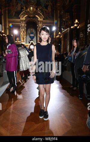 Chinese actress Zhou Dongyu poses at the Stella Mccartney fashion show during the 2015 Fall/Winter Paris Fashion Week in Paris, France, 9 March 2015. Stock Photo