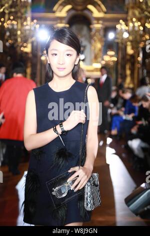 Chinese actress Zhou Dongyu poses at the Stella Mccartney fashion show during the 2015 Fall/Winter Paris Fashion Week in Paris, France, 9 March 2015. Stock Photo