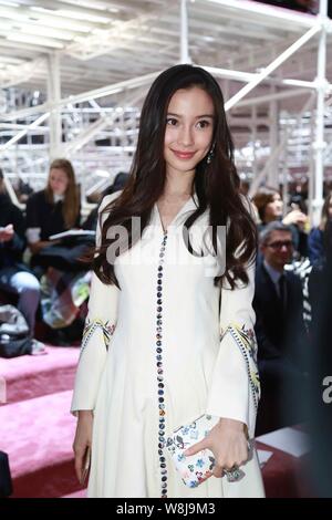 Hong Kong model and actress Angelababy poses at the Christian Dior fashion show during the Paris Haute Couture Fashion Week Spring/Summer 2015 in Pari Stock Photo