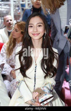 Hong Kong model and actress Angelababy smiles at the Christian Dior fashion show during the Paris Haute Couture Fashion Week Spring/Summer 2015 in Par Stock Photo