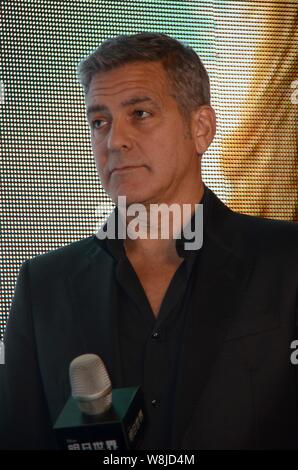 American actor George Clooney poses during a fan meeting event for his new movie 'Tomorrowland' in Shanghai, China, 22 May 2015. Stock Photo