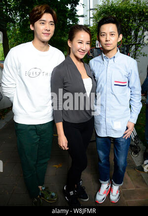 (From left) Chinese actor Li Yifeng, Taiwanese-American singer Coco Lee and Chinese director He Jiong pose at the shooting scene of their new movie in Stock Photo